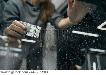Skilled Service Station Worker Fixing Ppf On Windscreen