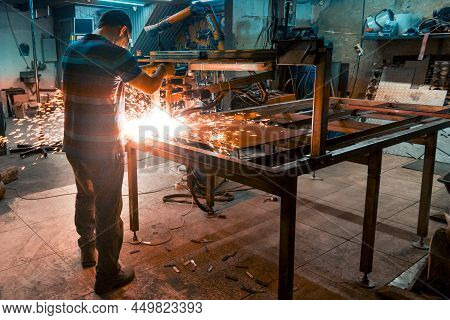 Plasma Sheet Metal Cutting Operator On A Rack