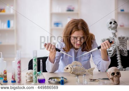 Young female zoologist working at the lab