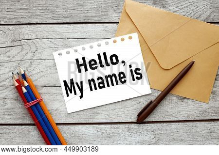 Hello My Name Is. Text On White Paper Near Envelope On Wooden Table