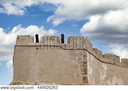 Guns On The Wall Of Tangier A Few Meters From The Port.