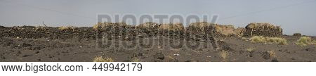 Landscape Panorama View Of Traditional Houses In Front Of Erta Ale Volcano In The Remote Regions Of 