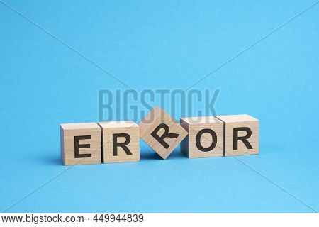 Error - Text On Wooden Blocks, Business Concept, Blue Background