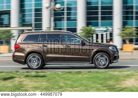 Brown Suv Mercedes Gls 350d Speeding On City Road. Moscow, Russia - August 2021