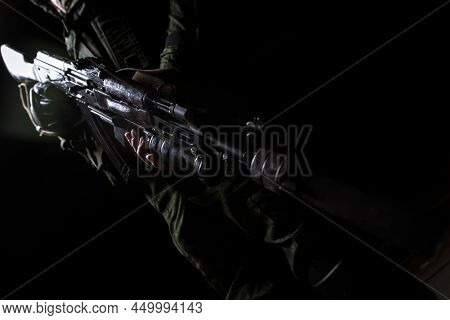 Kalashnikov Automatic Machine Gun Closeup In The Hands Of The Military. Male Hands Charge A Kalashni