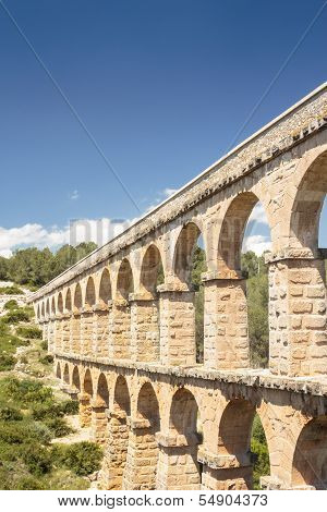 Ancient Roman Aqueduct In Spain, Europe