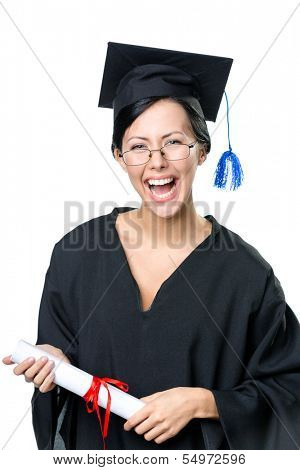 Graduating student in spectacles and academic gown with the diploma, isolated on white
