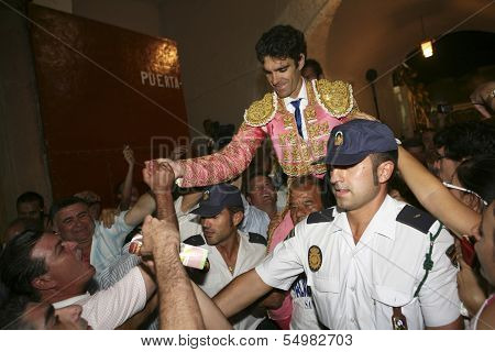 Spanish Bullfighter Jose Tomas going out to shoulders for the big door after one having big bullfigh