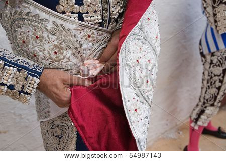 Bullfighter getting dressed for the paseillo or initial parade