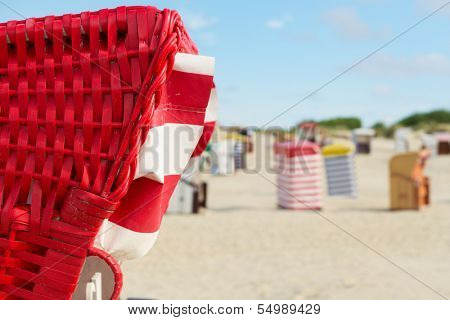 Typical striped chairs on German Borkum at the beach