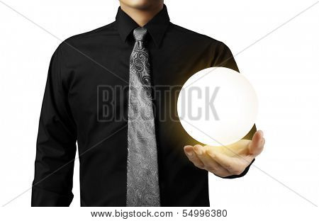 Businessman hand holding the Crystal Ball 