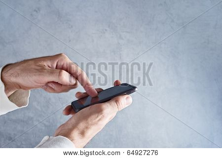 Touch Screen Mobile Smart Phone In Male Hands