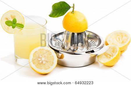Lemon Juice, Squeezer And Fruits