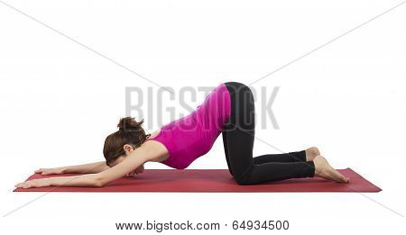 Woman Doing Puppy Dog Pose In Yoga