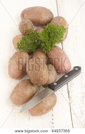 Raw Potato With Parsley And Knife
