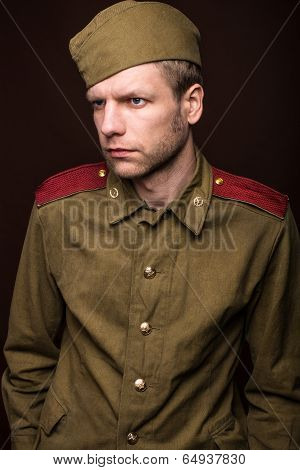 Russian soldier looks at something