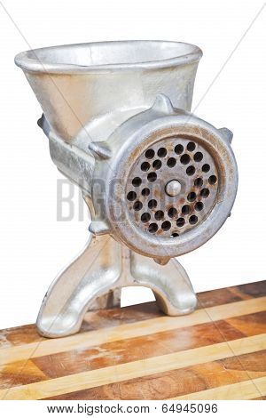 Old Iron Meat Grinder Mounted On Table