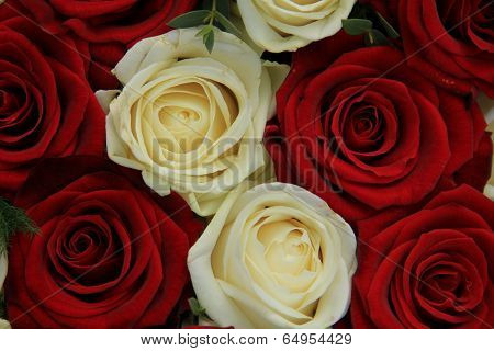 Red And White Roses In A Wedding Arrangement