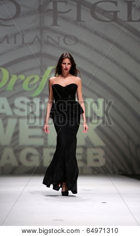 ZAGREB, CROATIA - MAY 09: Fashion model wearing clothes designed by Avaro Figlio on the Zagreb Fashion Week on May 09, 2014 in Zagreb, Croatia.