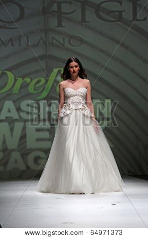 ZAGREB, CROATIA - MAY 09: Fashion model wearing clothes designed by Avaro Figlio on the Zagreb Fashion Week on May 09, 2014 in Zagreb, Croatia.
