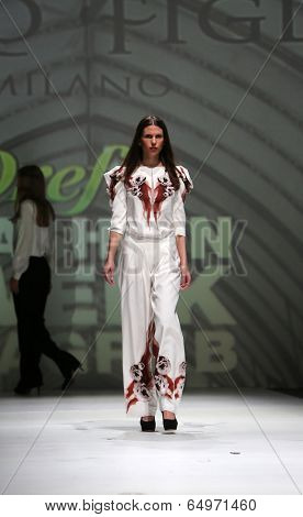 ZAGREB, CROATIA - MAY 09: Fashion model wearing clothes designed by Avaro Figlio on the Zagreb Fashion Week on May 09, 2014 in Zagreb, Croatia.