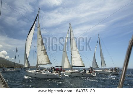 AEGEAN SEA, GREECE - APR 29, 2014: Unidentified sailboats participate in sailing regatta 