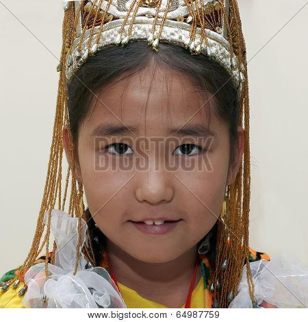 Ashgabat, Turkmenistan - August 4:  An Unidentified Asian Gerl  Looks Up And Smiles. Children's Foru
