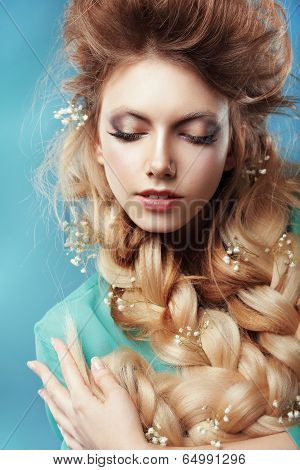 Enjoyment. Woman With Plait And Intertwined Flowers