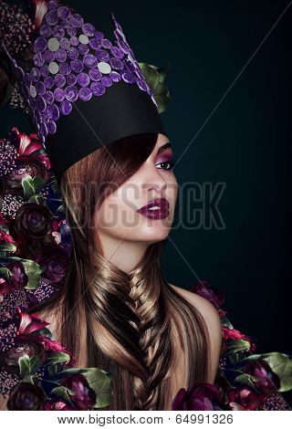 Outlandish Fashion Model In Theatrical Colorful Hat