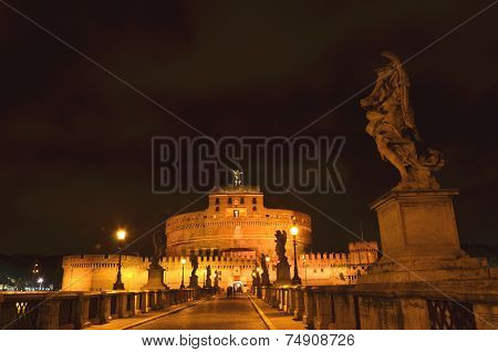 Majestic Castle of Saint Angel over the Tiber river by night in Rome, Italy.