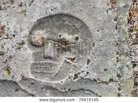 Skull On A Gravestone