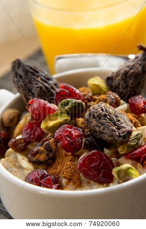 Healthy Breakfast Oatmeal With Dried  Fruit And Nut Toppings