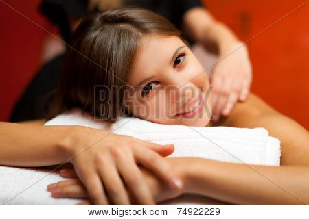 Woman having a massage in a spa