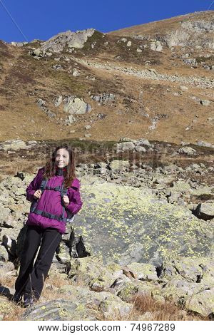 Young Hiker Woman Walking On Mountain