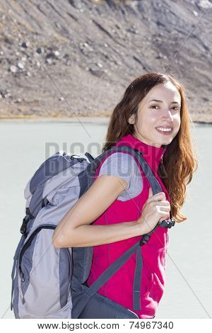 Young Female Hiker Outdoors With Her Backpack