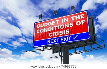 Budget in the Conditions of Crisis on Red Billboard.