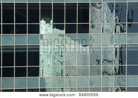 Reflection of an office building, Gurgaon, Haryana, India