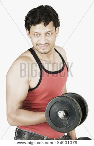 Man exercising with dumbbells