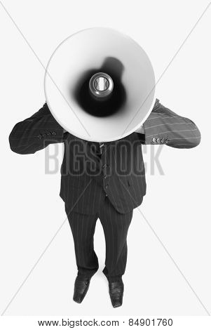 Face of a businessman coverd by a megaphone