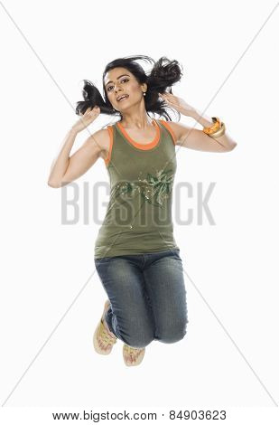 Portrait of a woman jumping
