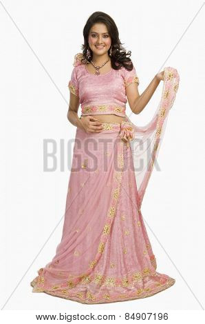 Portrait of a beautiful woman posing in traditional dress