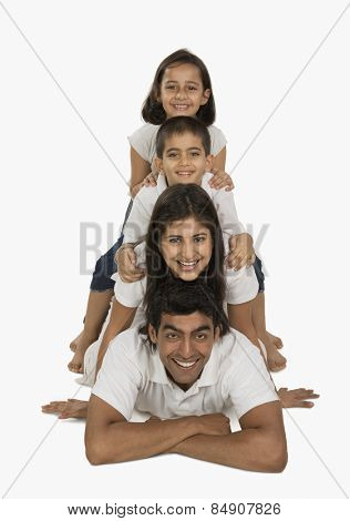 Portrait of parents with their children smiling