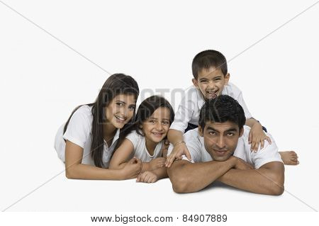 Portrait of parents with their children smiling