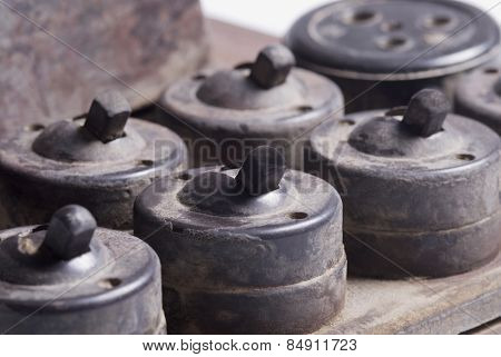 Close-up of dirty lightswitches and sockets