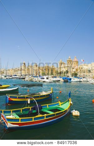 Boats with a church in the background, San Lawrenz Church, Grand Harbor, Birgu, Malta