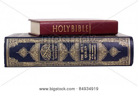 Close-up of the Koran and the Bible