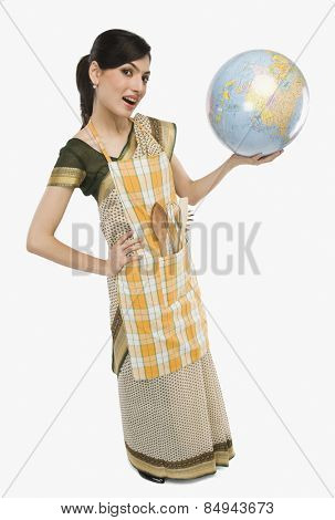 Woman holding a globe