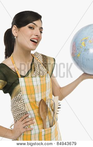 Woman holding a globe