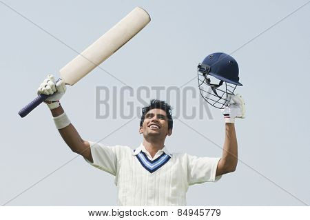 Cricket batsman celebrating his success