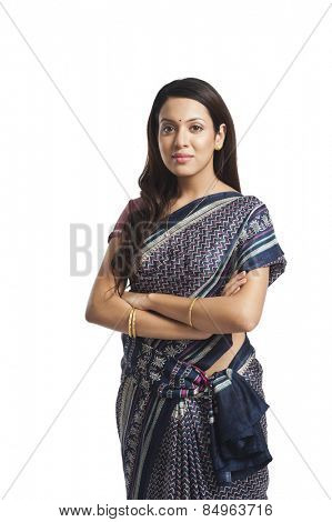 Woman standing with her arms crossed